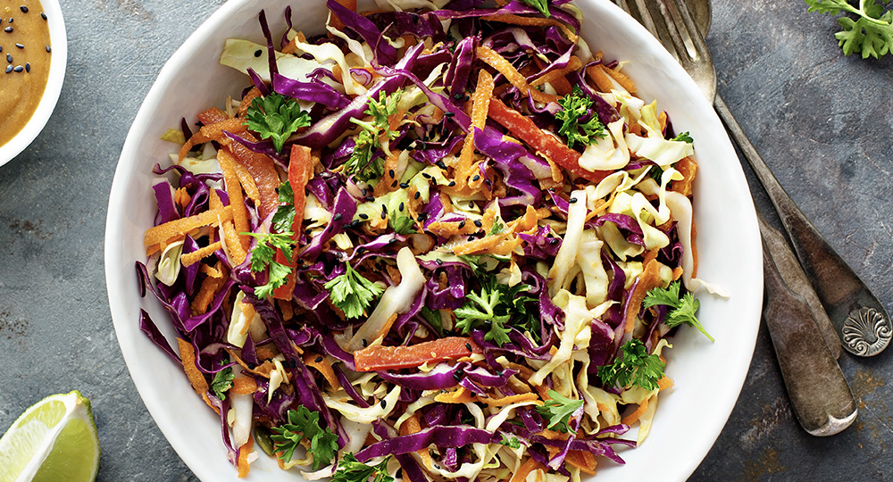 bowl of fresh produce and organic meal, part of prairieland market's prepared foods