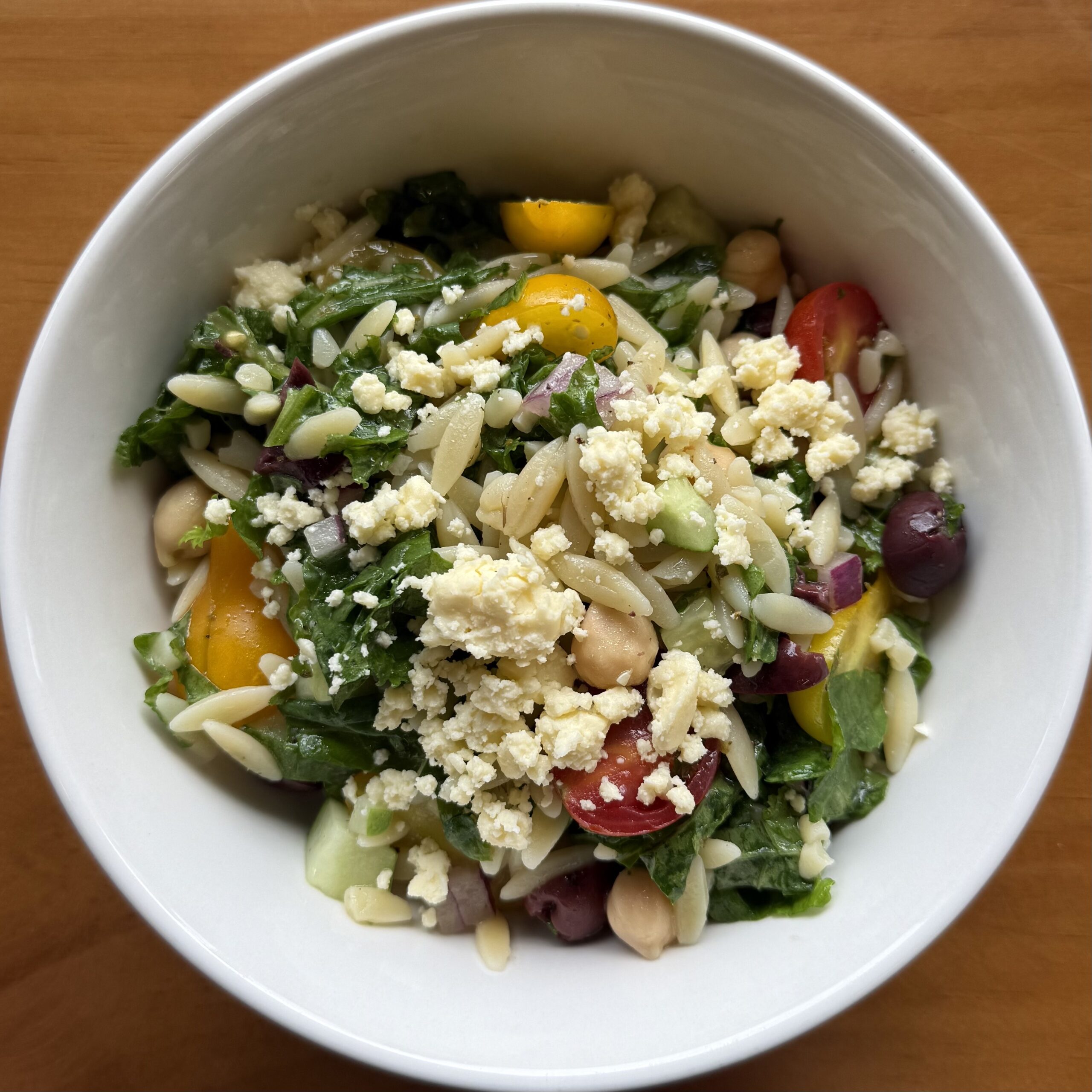 orzo salad with tomato, cucumber, feta, olives and garbanzo beans