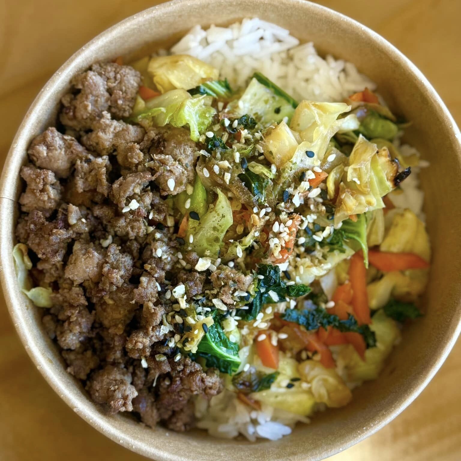 rice bowl with ground pork and vegetables