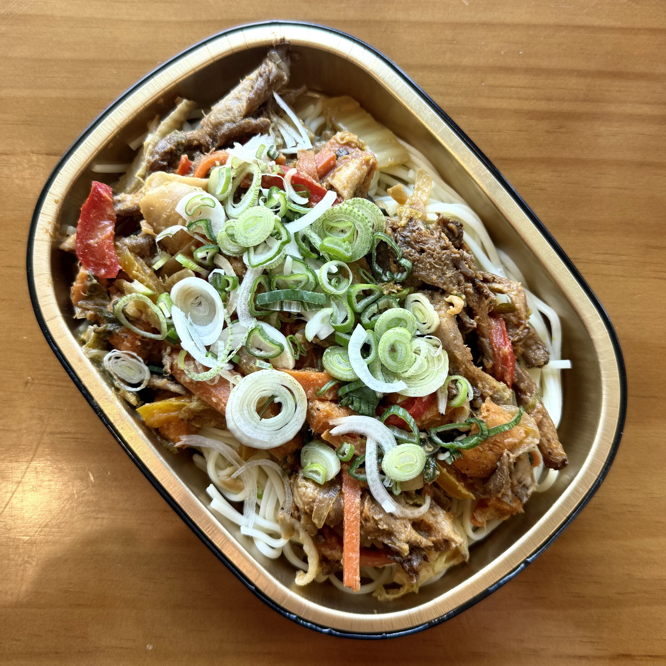 stir fry with mushrooms, carrots, peppers, green onions and noodles